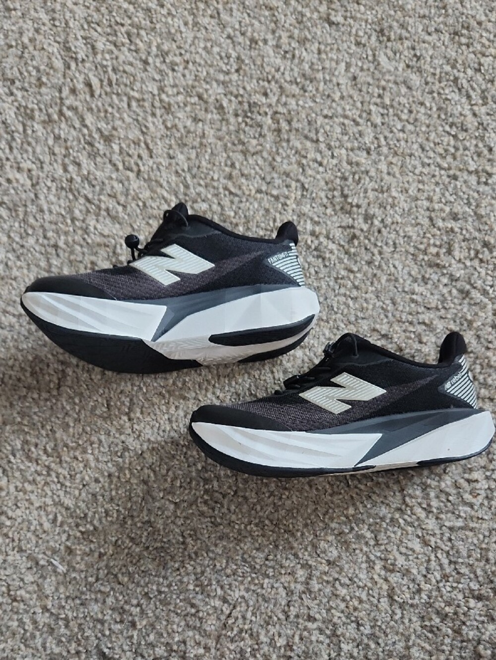New Balance Kids’s Black and White Rebel Athletic Shoes - Picture 2 of 3